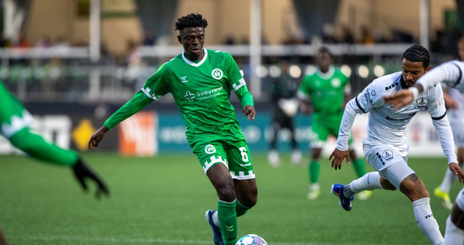 Player dribbling the ball in USL match Player dribbling the ball in USL match
