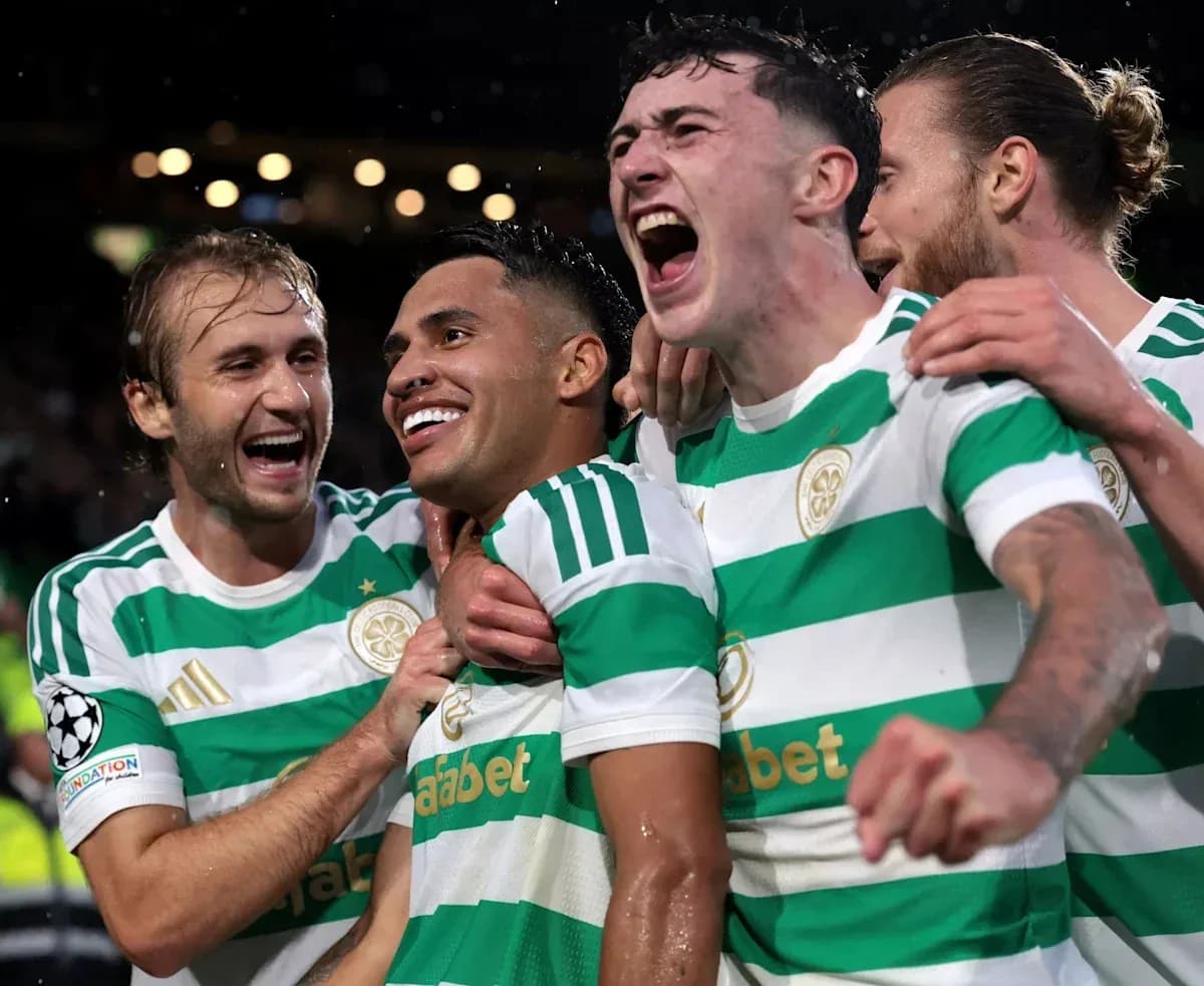 Celtic players celebrating a goal in Champions League Celtic players celebrating a goal in Champions League