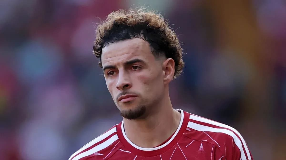 Player in red jersey during match Player in red jersey during match