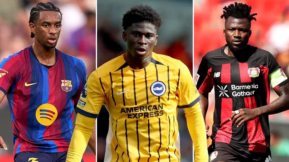 Three football players in their club jerseys Three football players in their club jerseys