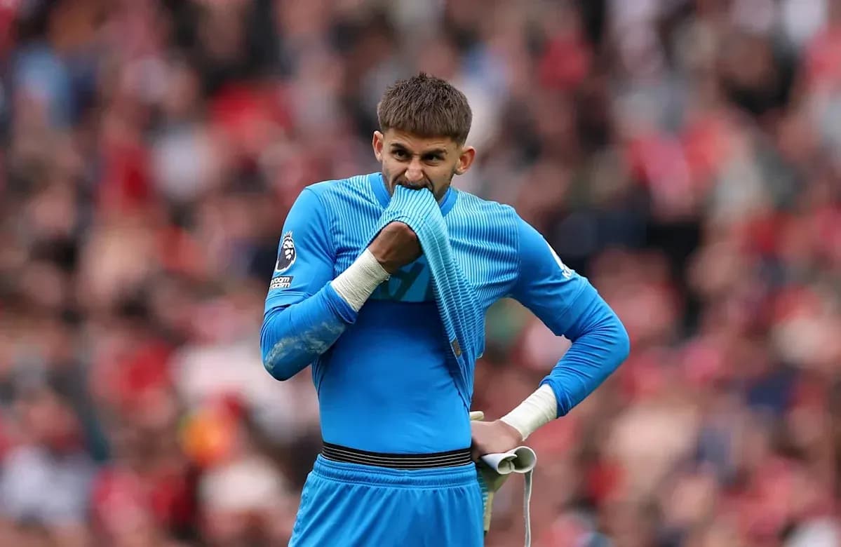Goalkeeper biting his jersey during a match Goalkeeper biting his jersey during a match