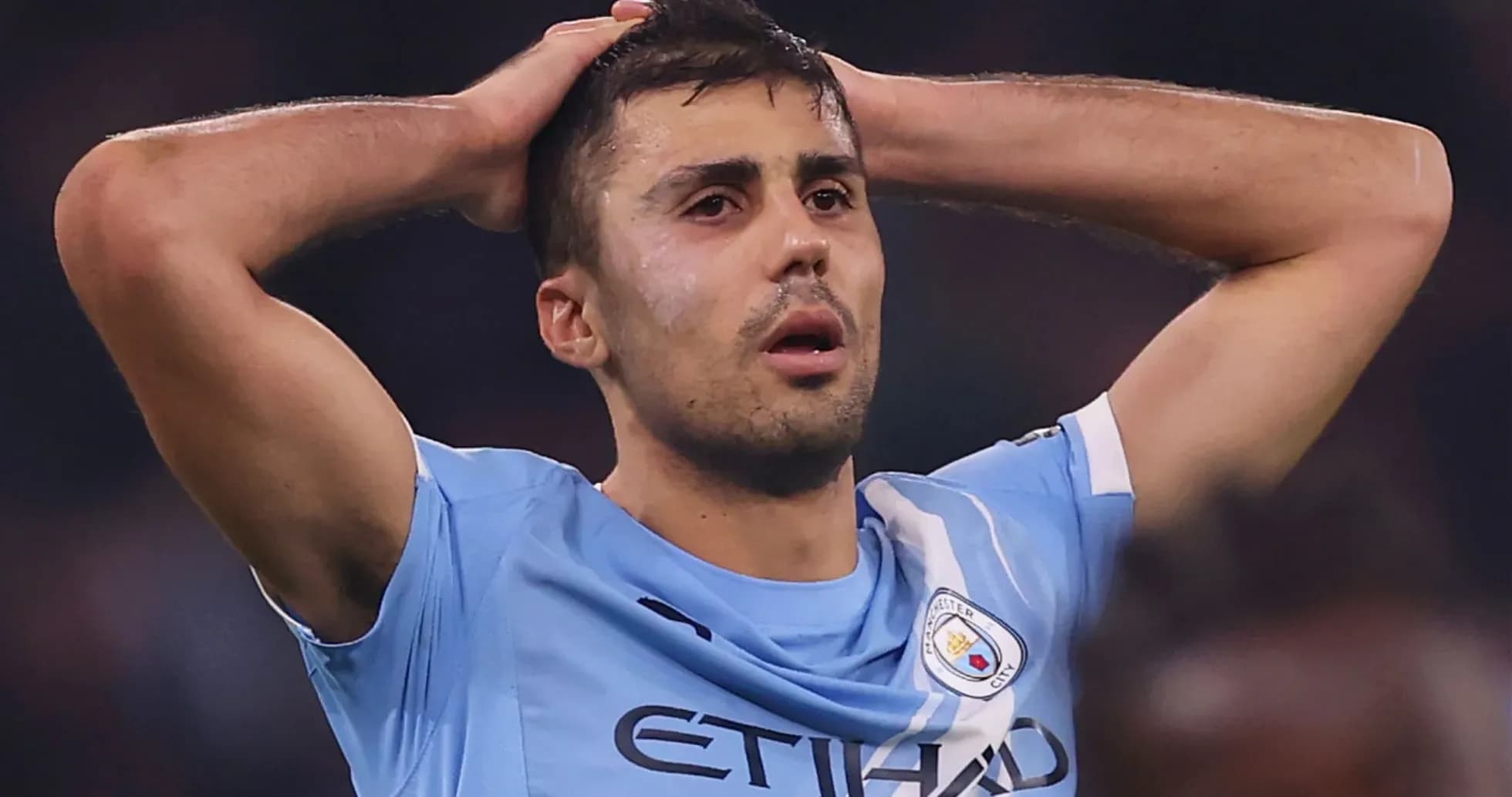 Player holding head in distress during match Player holding head in distress during match