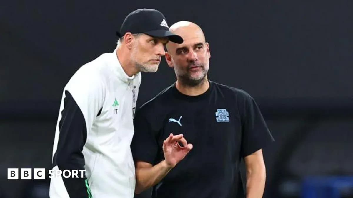 Two football managers discussing strategies on the pitch Two football managers discussing strategies on the pitch
