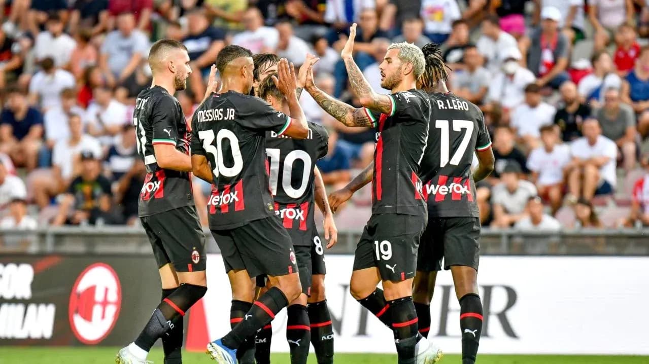 AC Milan players celebrating a goal AC Milan players celebrating a goal