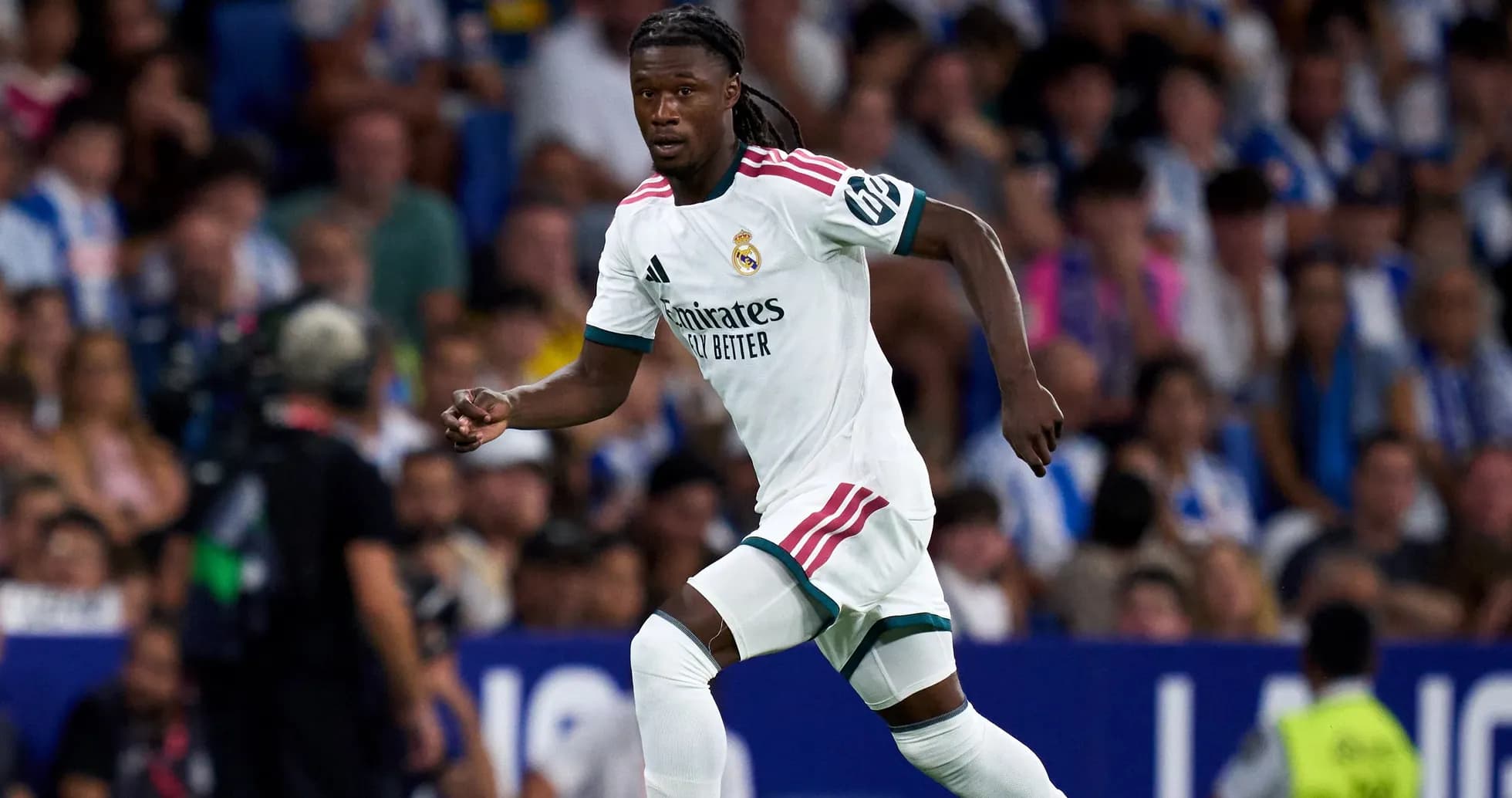 Player running during a match for Real Madrid Player running during a match for Real Madrid