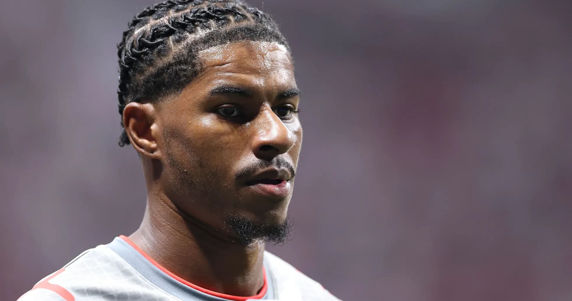 Player with braided hair in sports attire Player with braided hair in sports attire