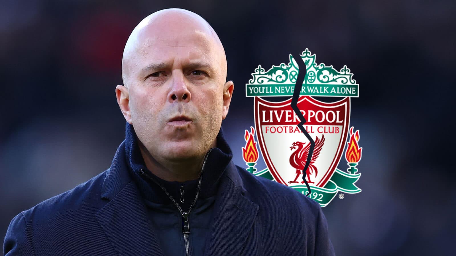Coach in front of Liverpool FC logo Coach in front of Liverpool FC logo