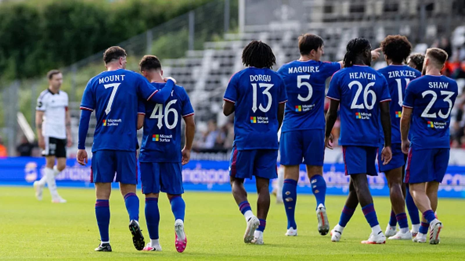 Players celebrating together during a match Players celebrating together during a match