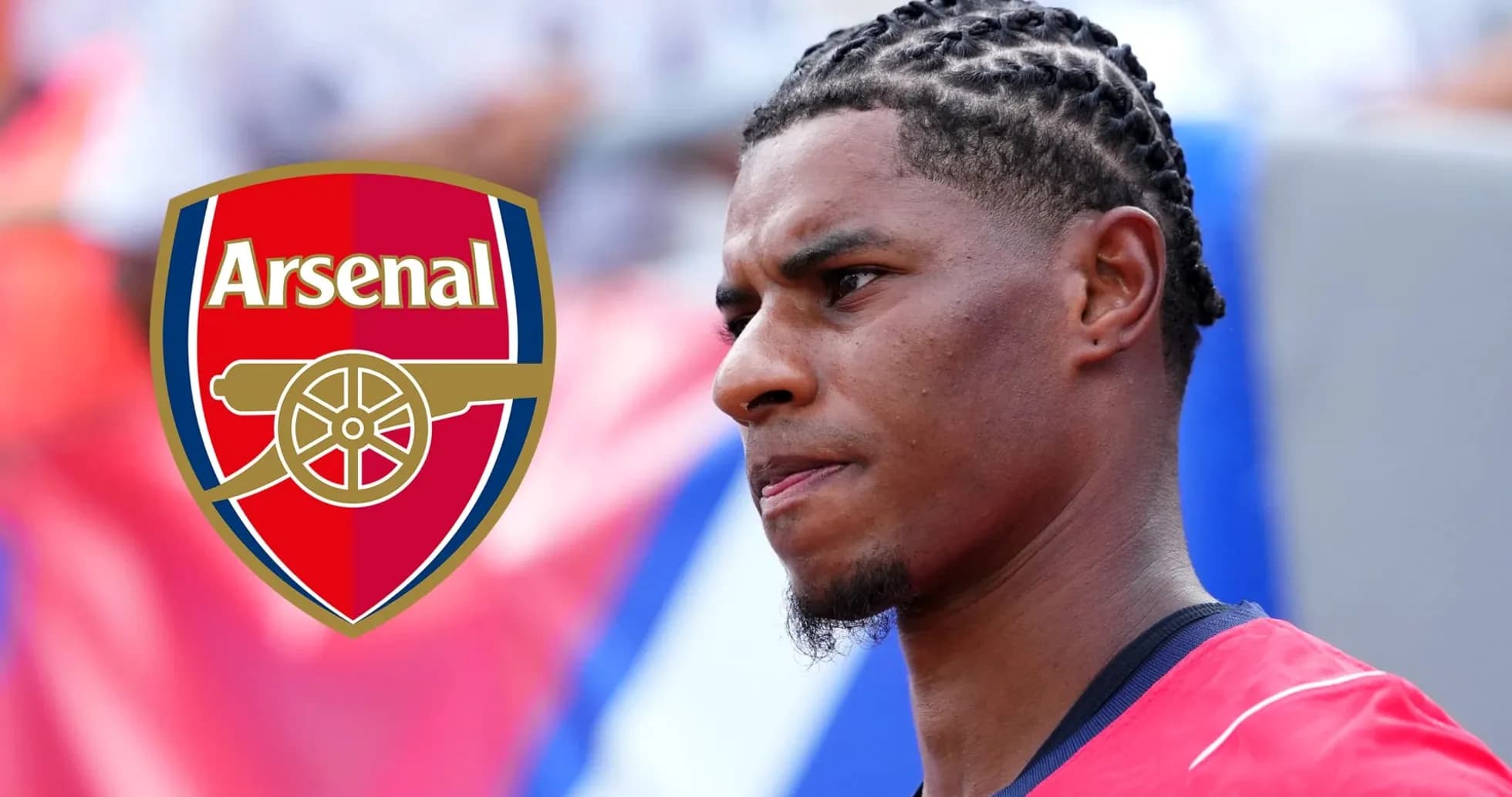 Player with braided hair near Arsenal logo Player with braided hair near Arsenal logo