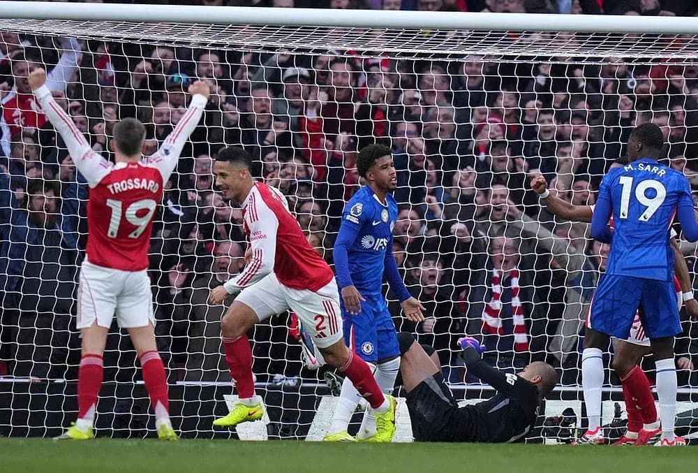 Arsenal players celebrating a goal against Chelsea Arsenal players celebrating a goal against Chelsea