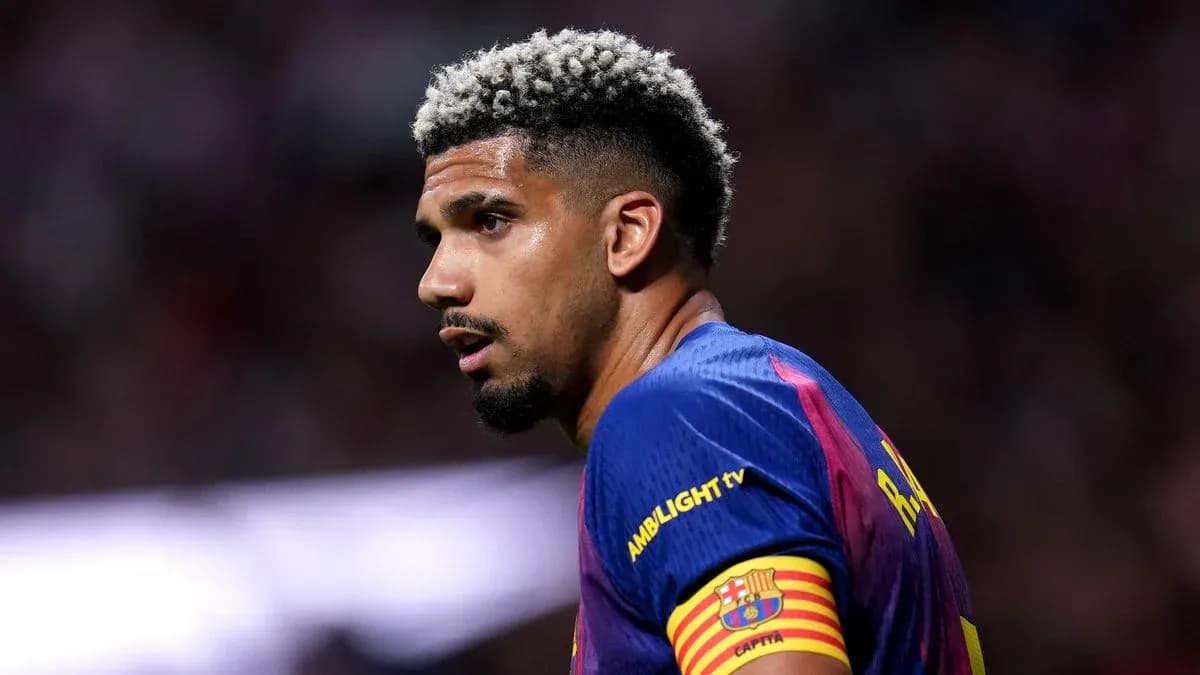 Football player wearing Barcelona jersey during match Football player wearing Barcelona jersey during match