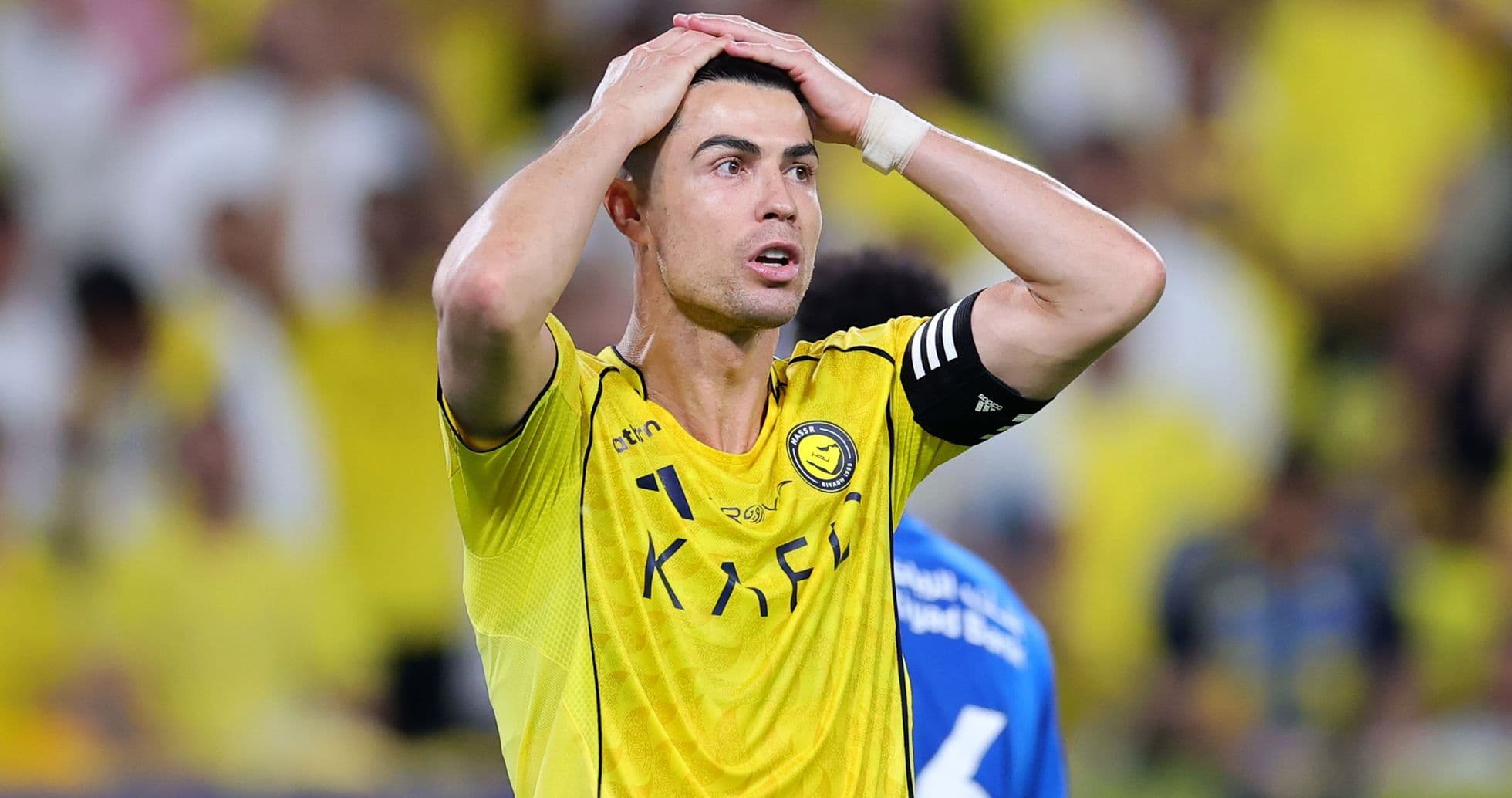 Player in yellow jersey reacting during match Player in yellow jersey reacting during match