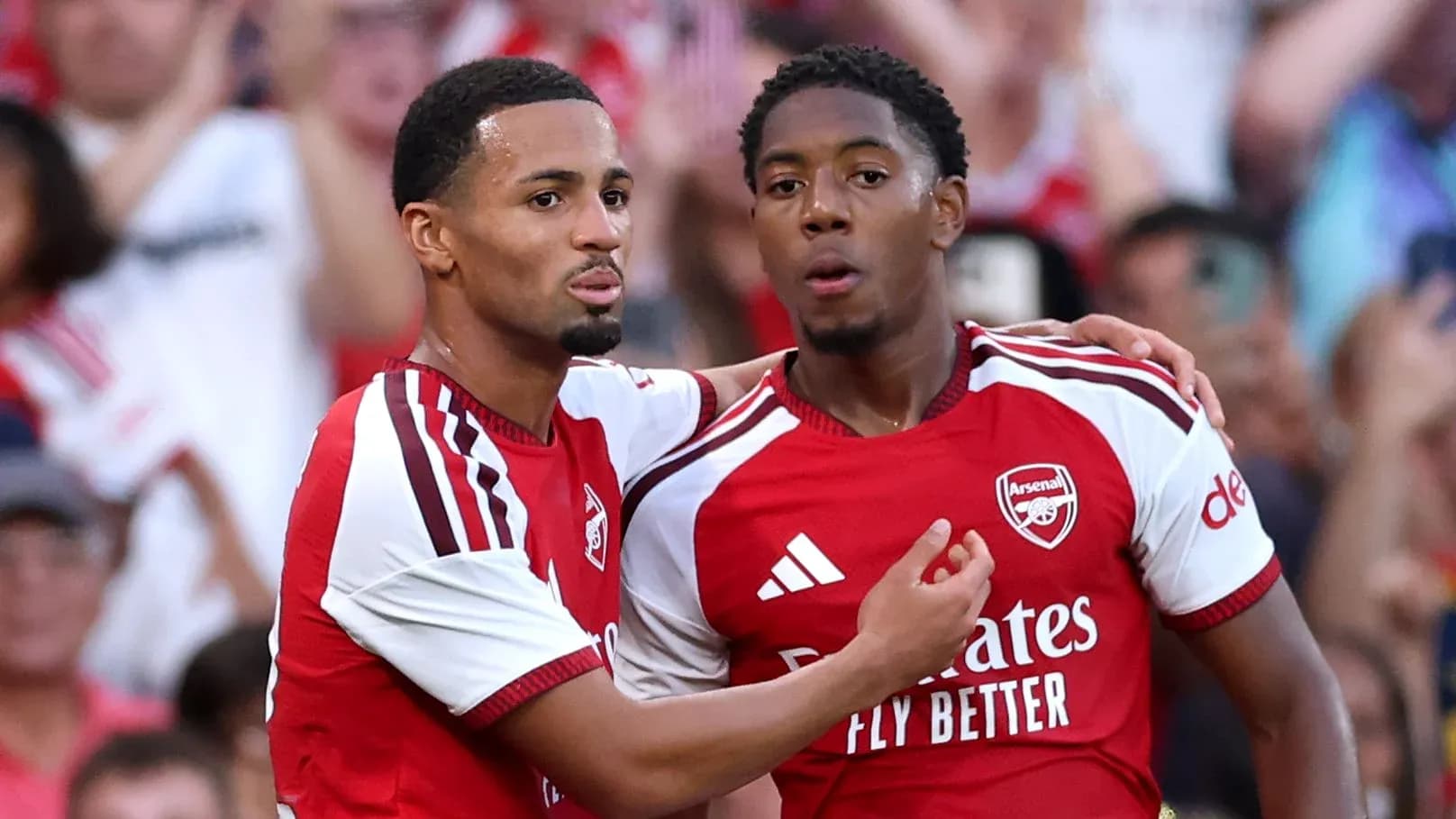 Arsenal players celebrating after scoring a goal Arsenal players celebrating after scoring a goal