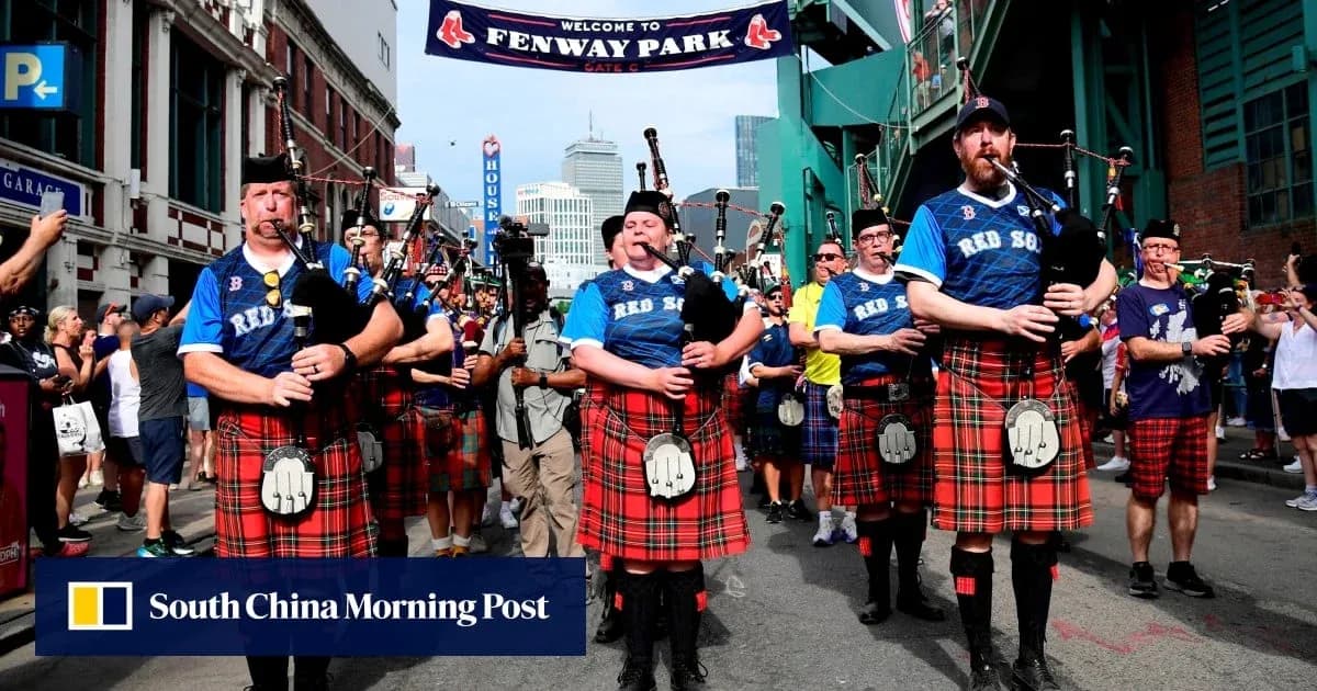 Bagpipers in kilts marching near Fenway Park Bagpipers in kilts marching near Fenway Park