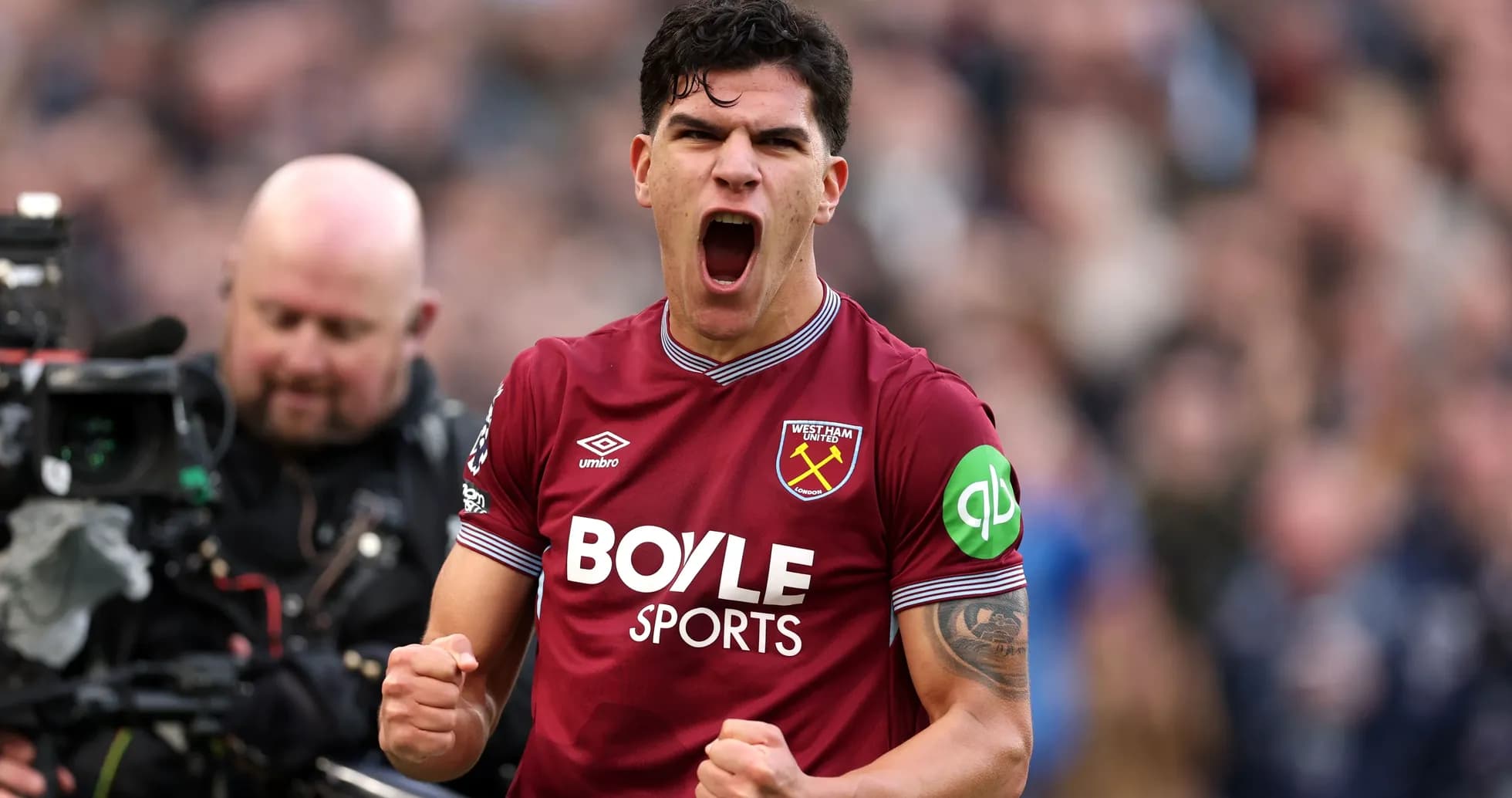 Player celebrating passionately in West Ham United jersey Player celebrating passionately in West Ham United jersey