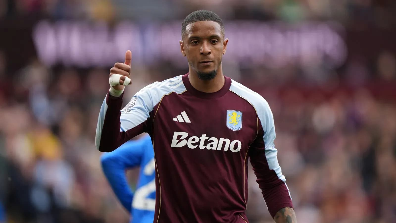 Goalkeeper in Aston Villa kit giving thumbs up Goalkeeper in Aston Villa kit giving thumbs up