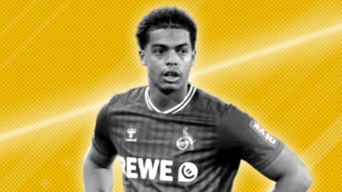 Player in REWE jersey posing against yellow background Player in REWE jersey posing against yellow background