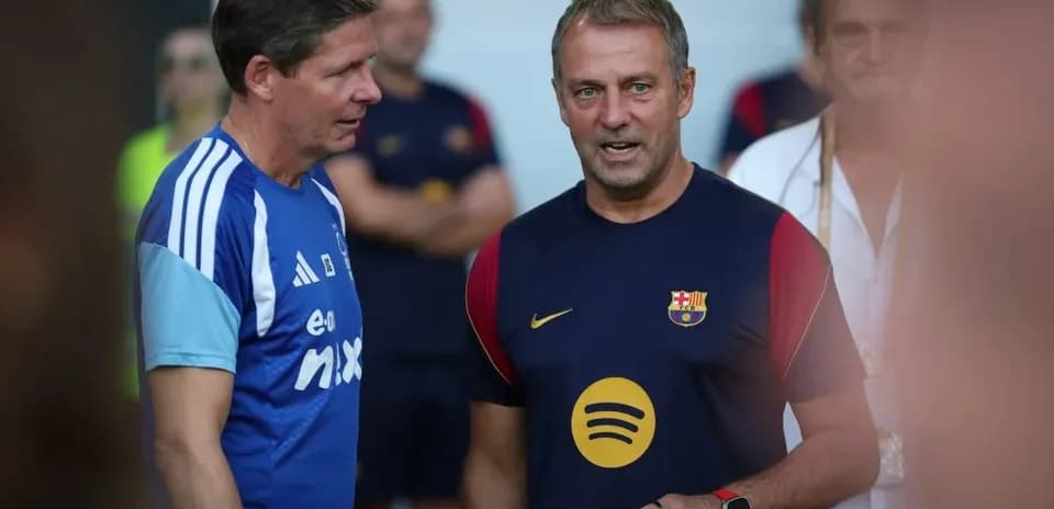 Coaches discussing during Barcelona training session Coaches discussing during Barcelona training session