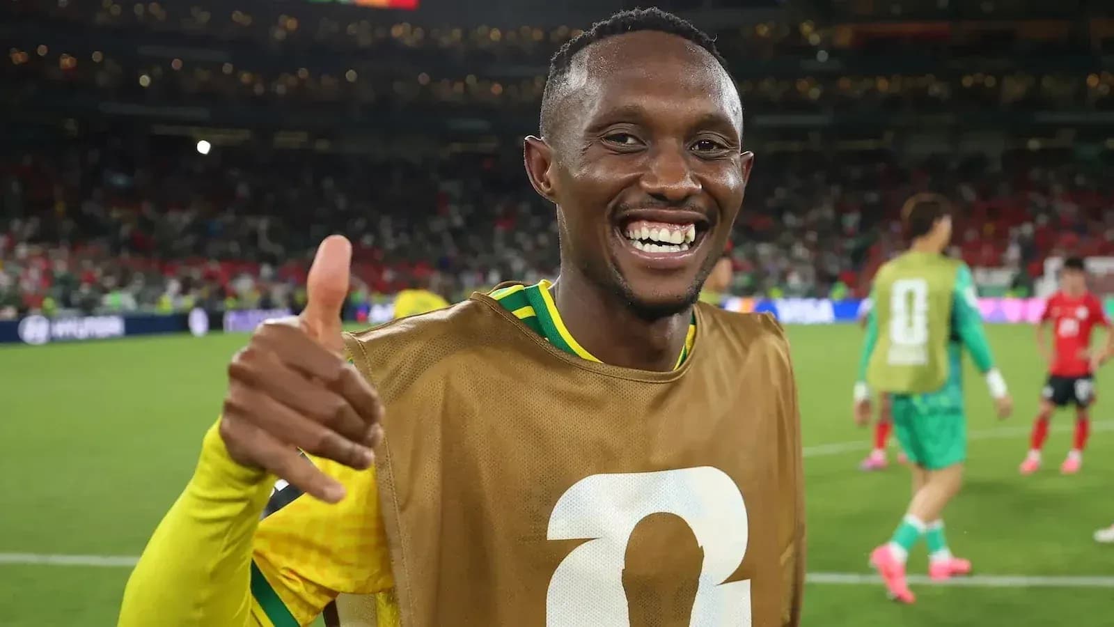 Player celebrating with thumbs up after match Player celebrating with thumbs up after match