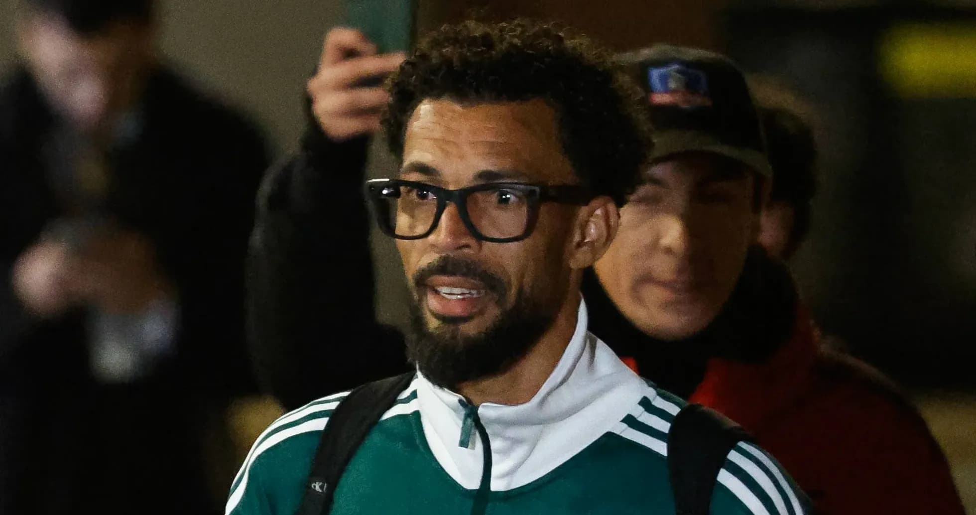 Player wearing glasses arriving at event venue Player wearing glasses arriving at event venue