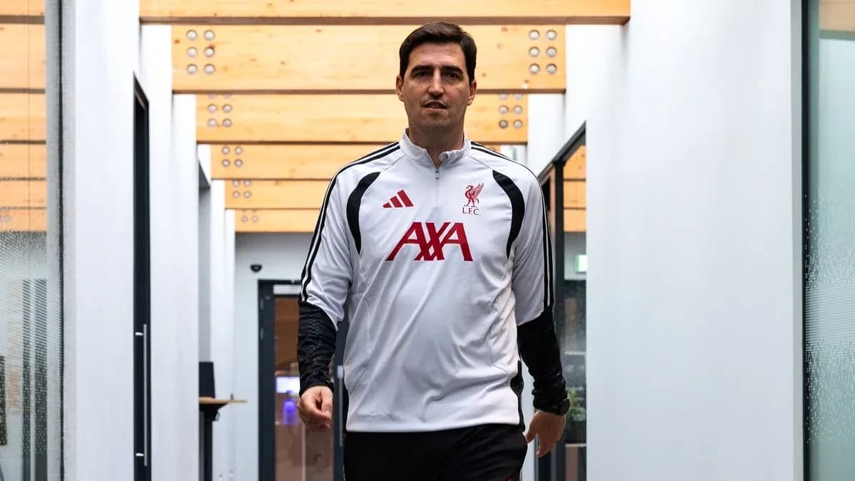 Player walking in Liverpool training facility corridor Player walking in Liverpool training facility corridor