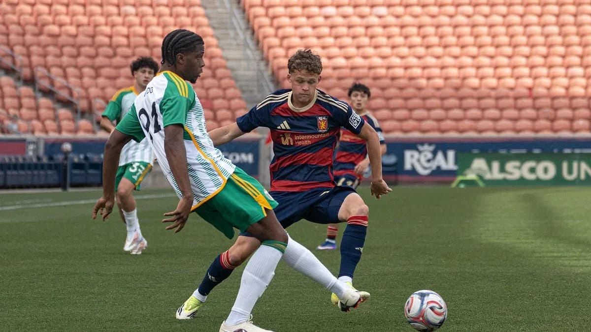 Real Monarchs player tackling Portland Timbers II player Real Monarchs player tackling Portland Timbers II player