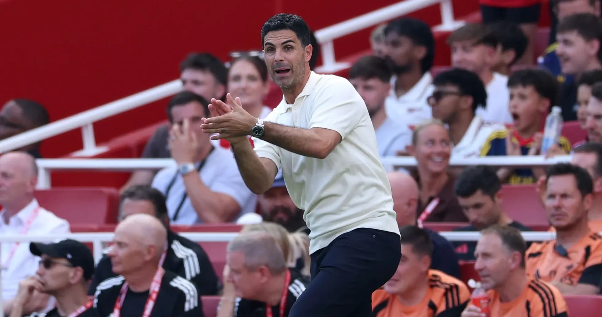 Manager giving instructions from the sidelines during match Manager giving instructions from the sidelines during match