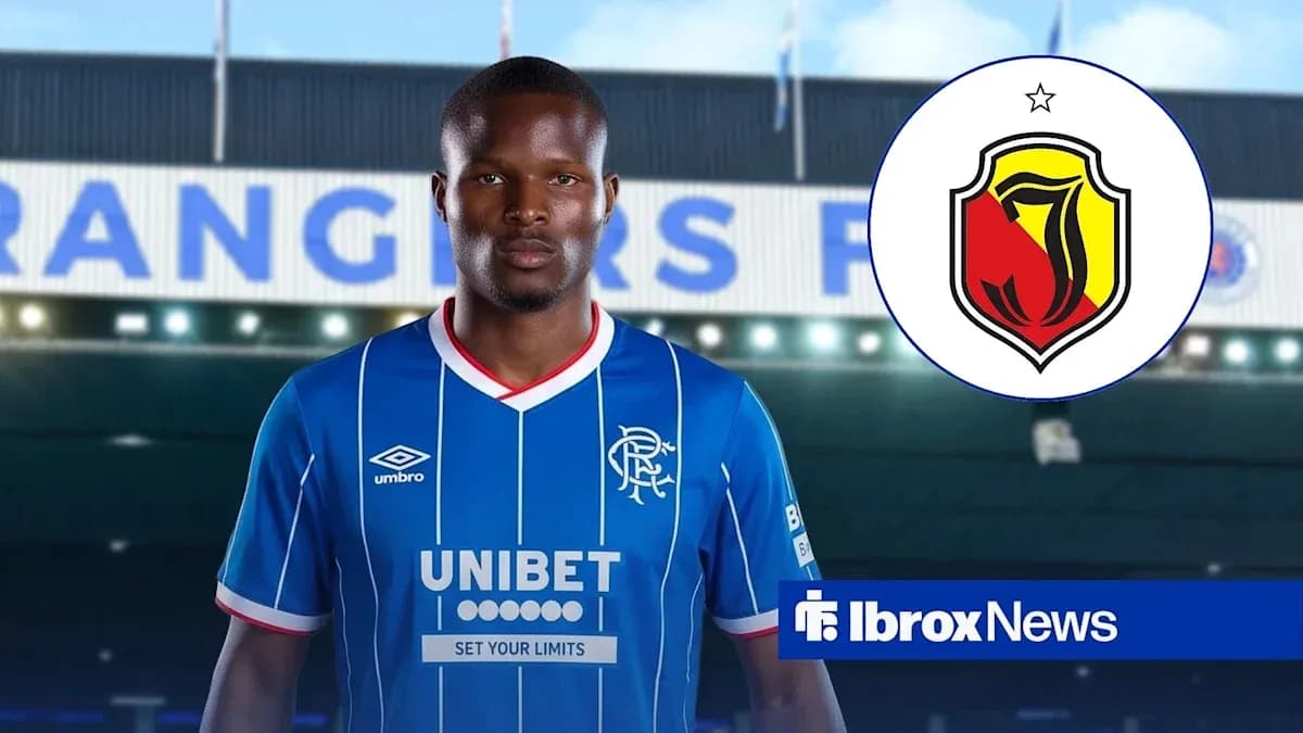 Player in Rangers kit with club logo background Player in Rangers kit with club logo background