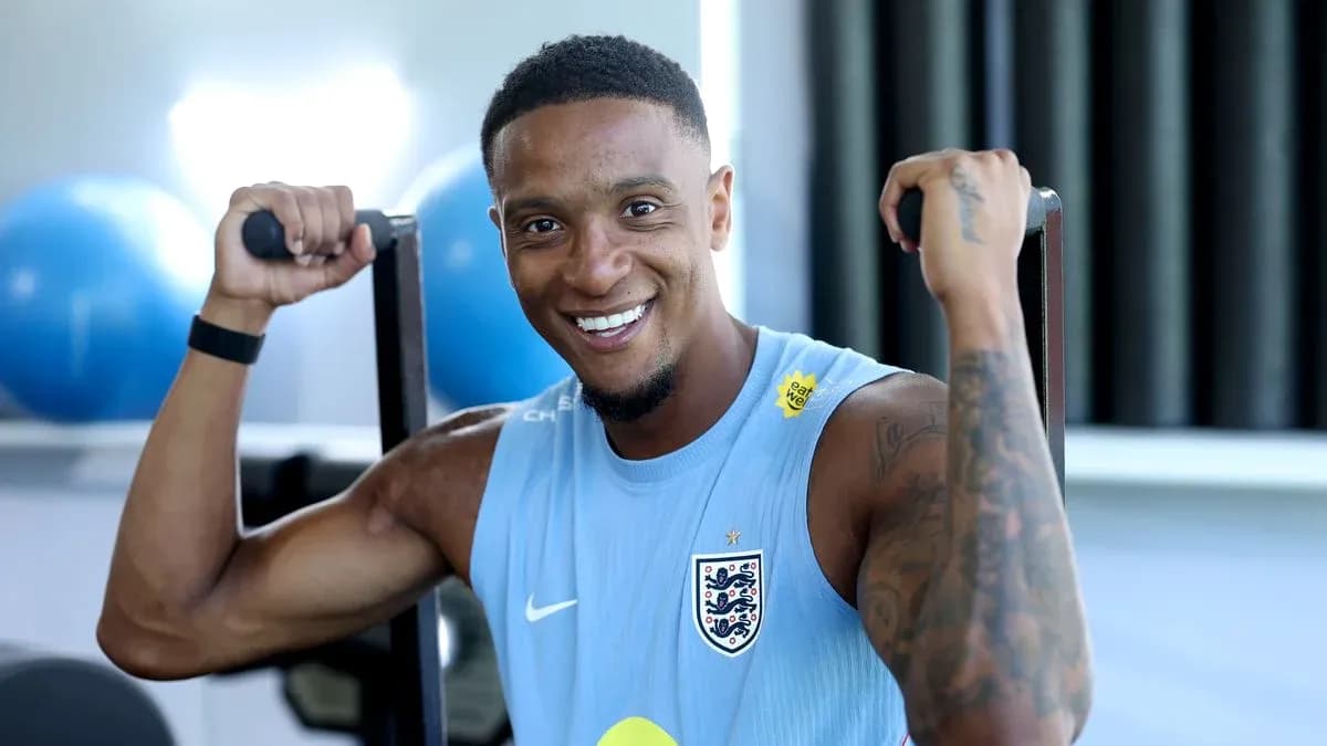 Player exercising with weights in training facility Player exercising with weights in training facility