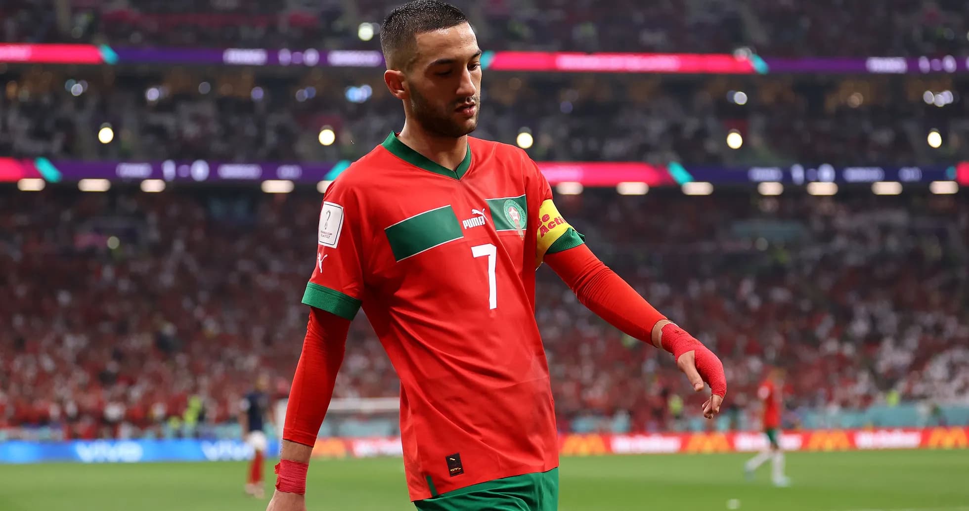 Moroccan player walking off the field during match Moroccan player walking off the field during match