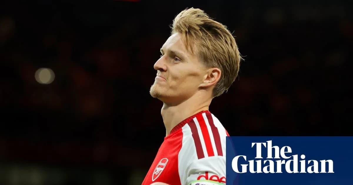 Arsenal player walking off the pitch after match Arsenal player walking off the pitch after match