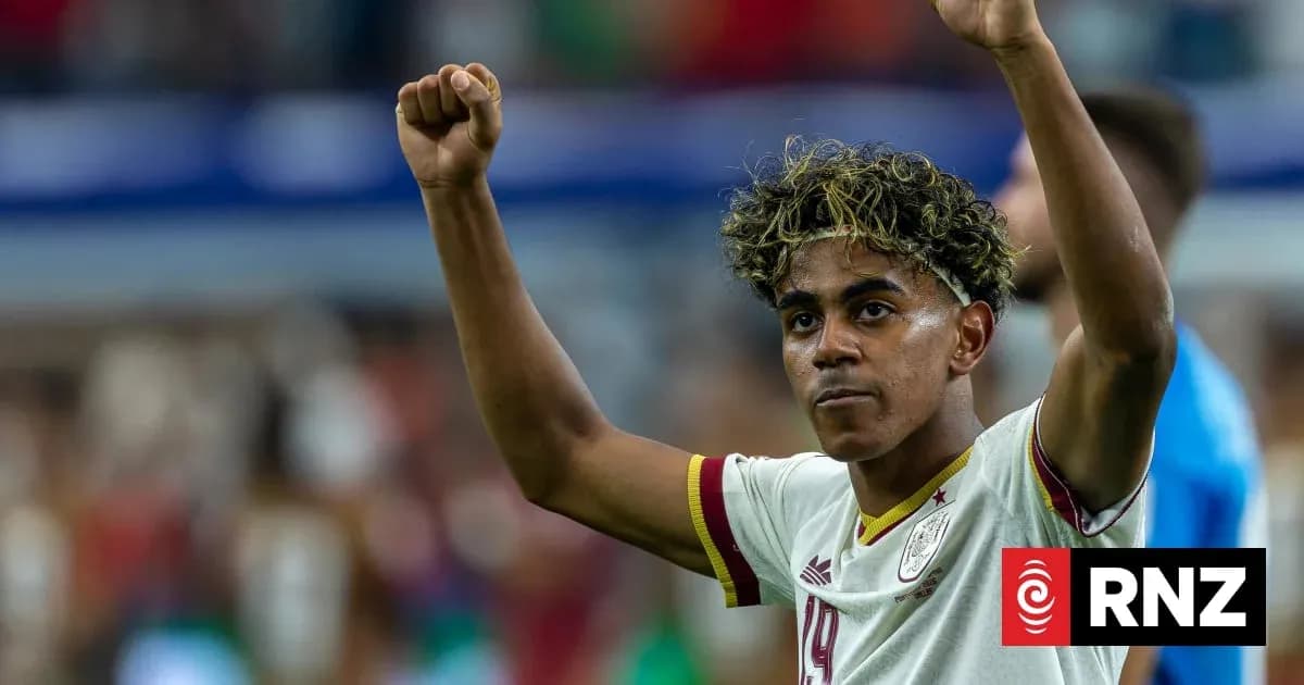 Player celebrating with raised fists after match Player celebrating with raised fists after match