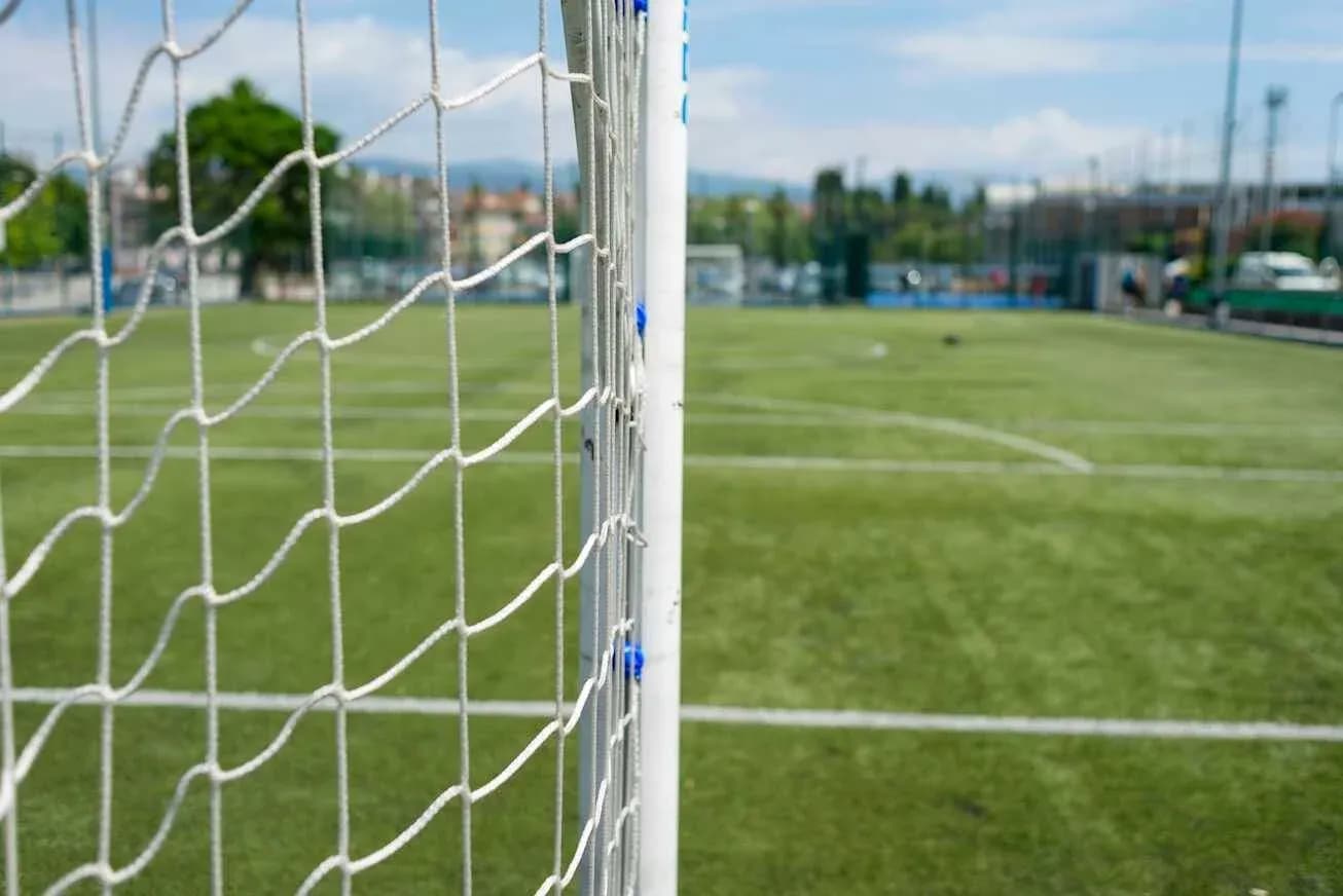 Goalpost with net on a soccer field Goalpost with net on a soccer field