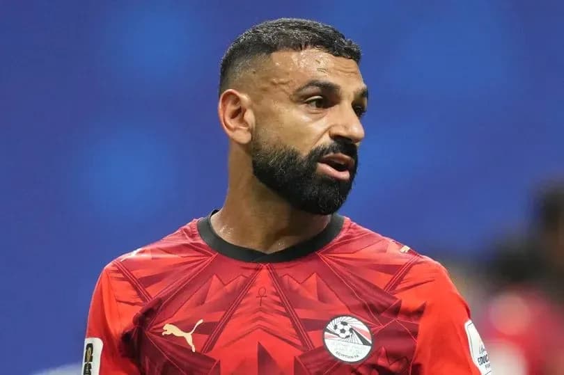 Player wearing red jersey during football match Player wearing red jersey during football match