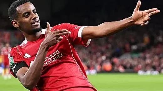 Player celebrating goal with hand gesture on field Player celebrating goal with hand gesture on field