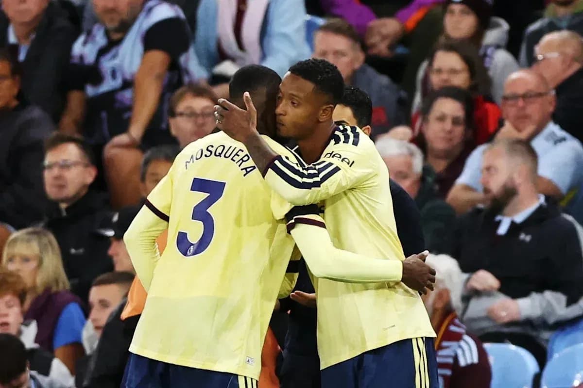 Players embracing on the sidelines during match Players embracing on the sidelines during match