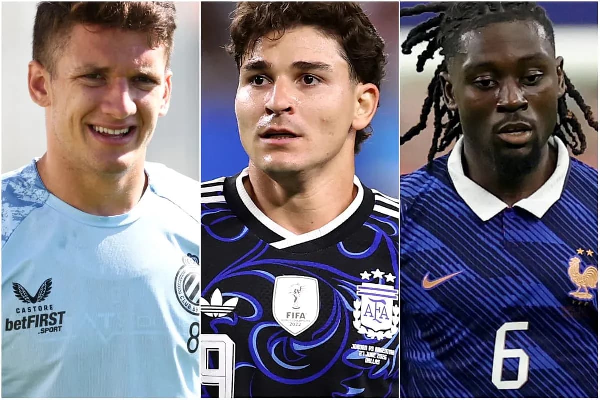 Three soccer players in their team jerseys Three soccer players in their team jerseys