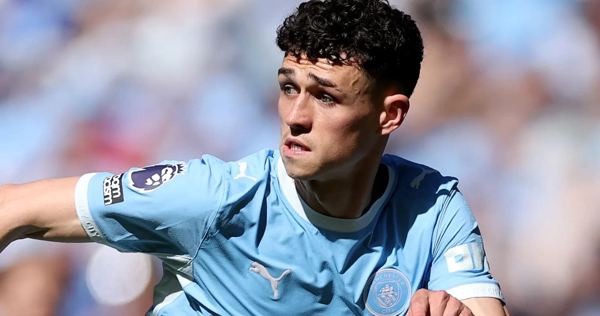 Player in Manchester City kit during match action Player in Manchester City kit during match action