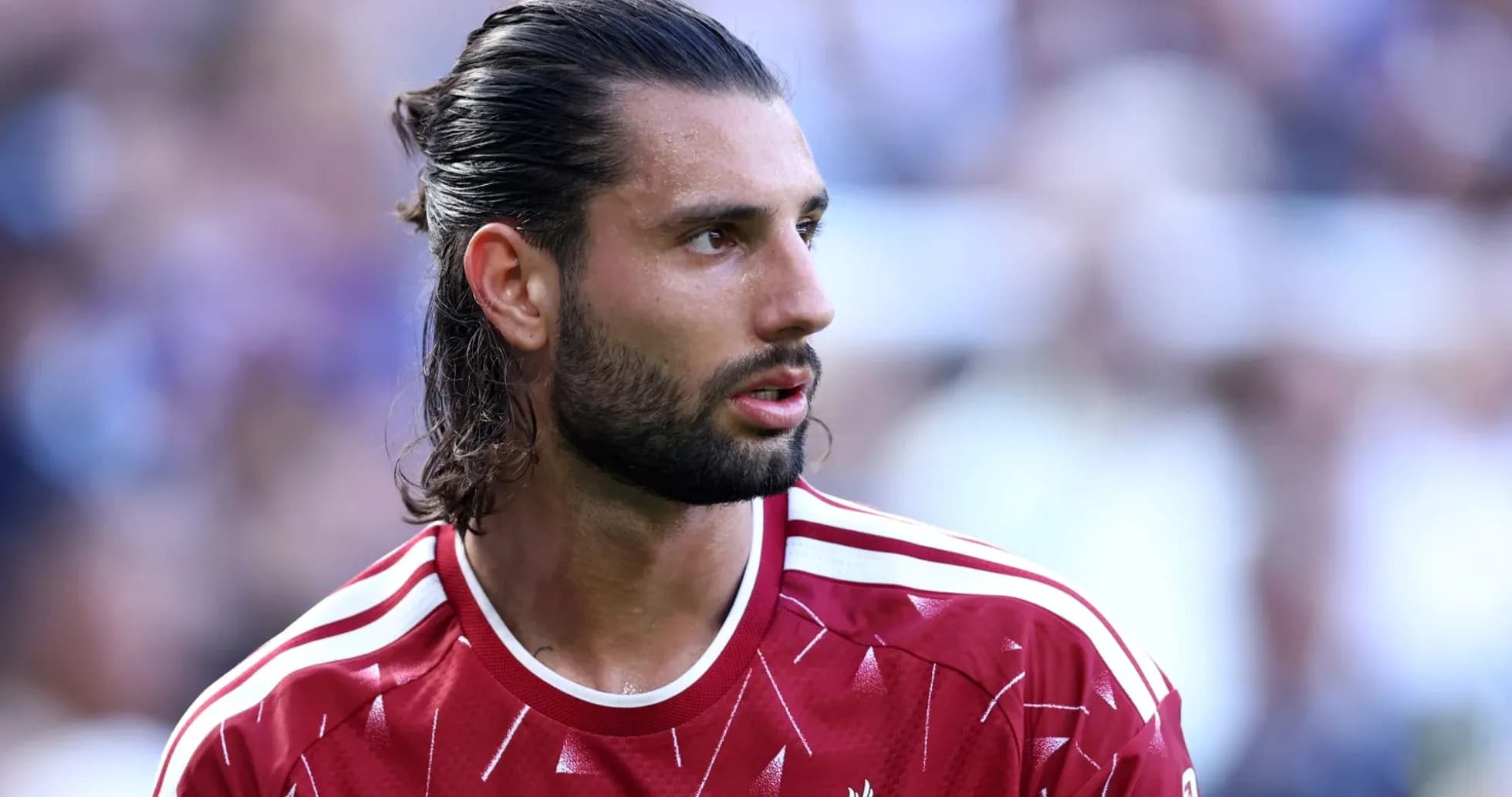 Player in red Liverpool kit during match Player in red Liverpool kit during match