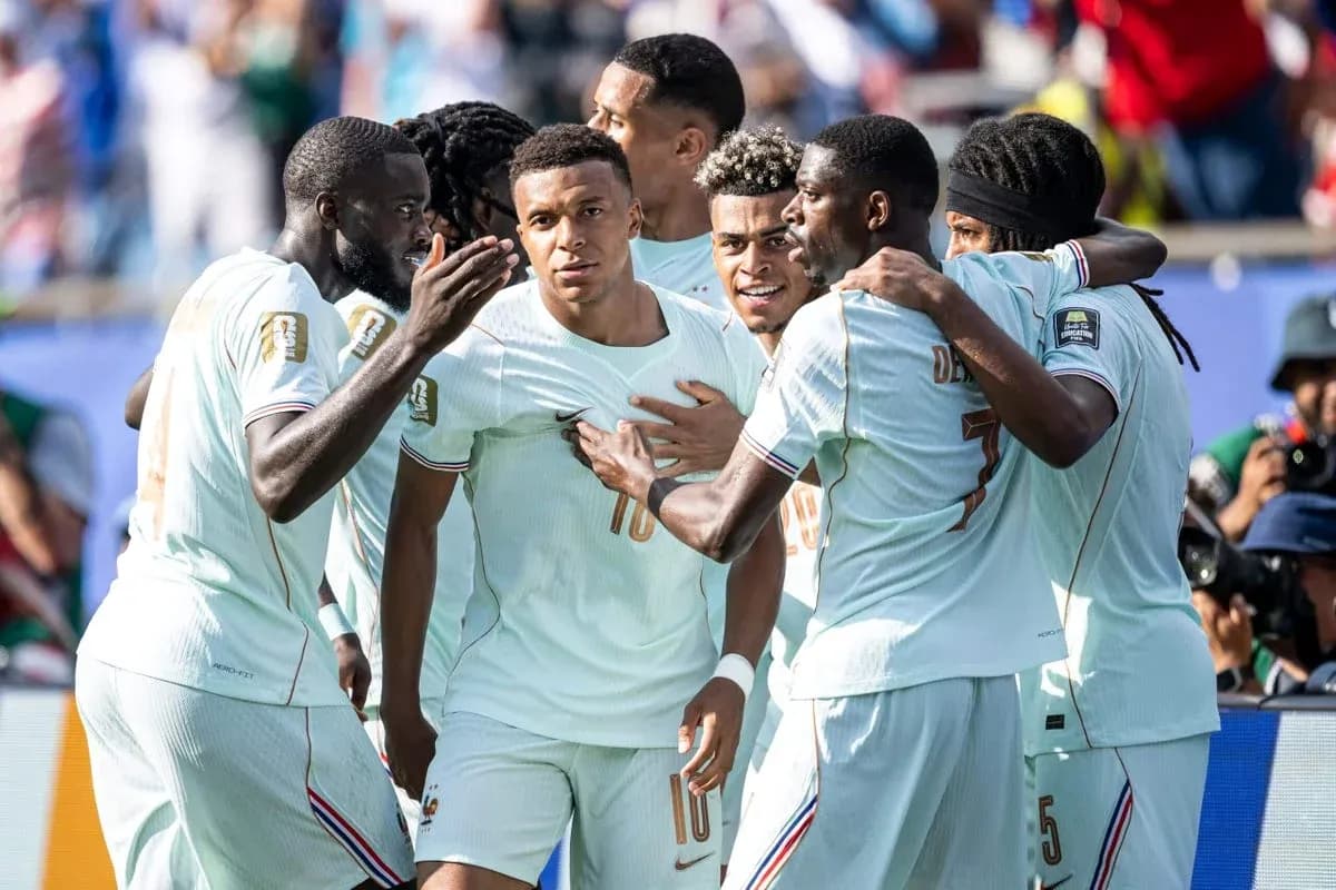 French team celebrating a goal on the field French team celebrating a goal on the field