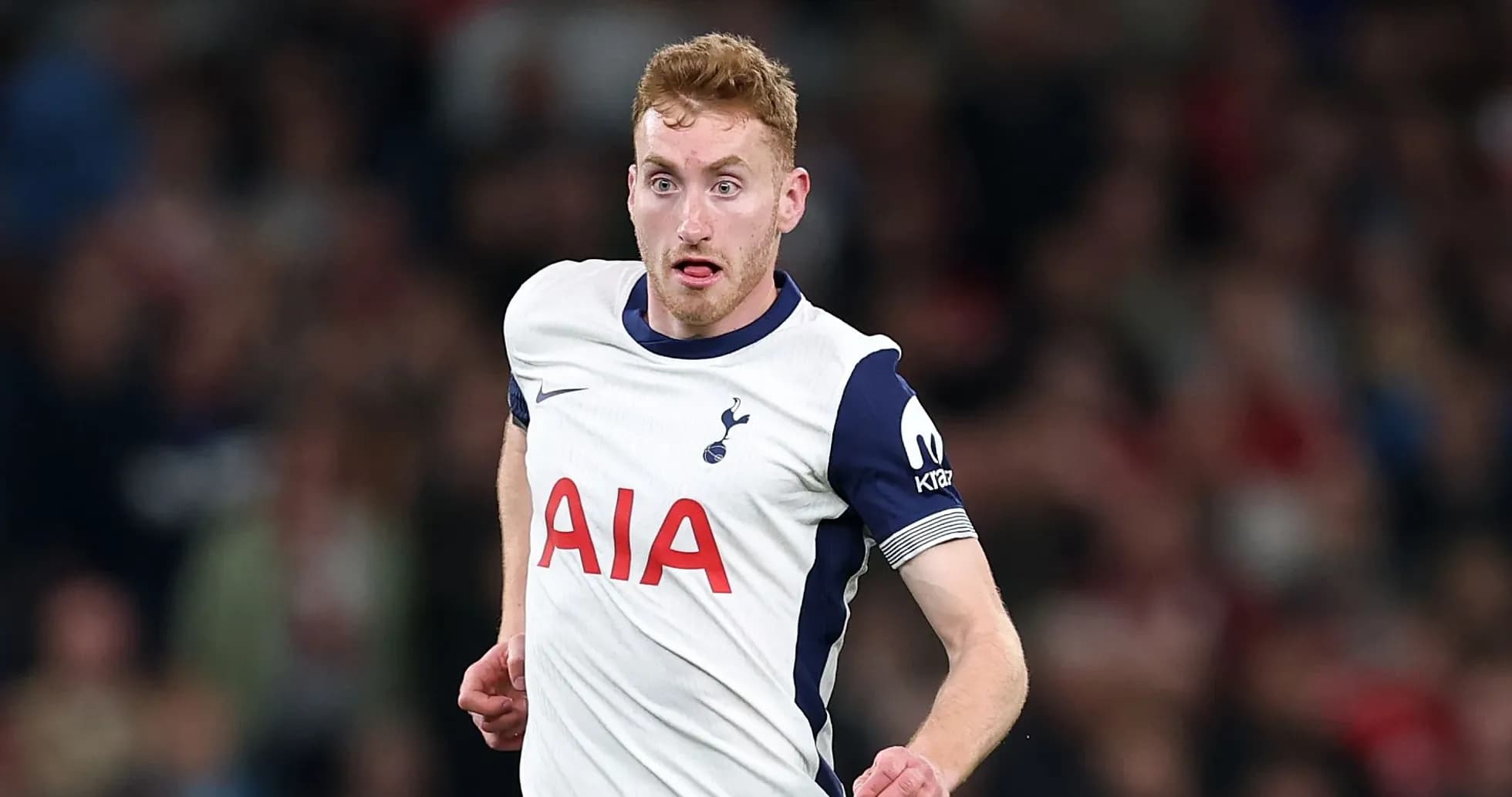 Player running during a football match for Tottenham Player running during a football match for Tottenham