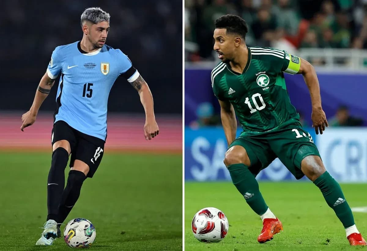 Uruguay and Saudi Arabia players in action Uruguay and Saudi Arabia players in action
