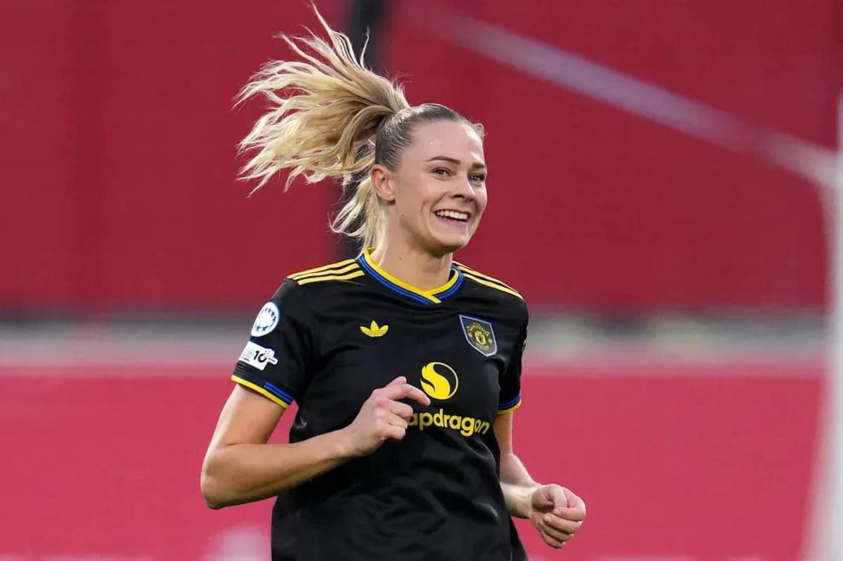 Player celebrating during a soccer match Player celebrating during a soccer match