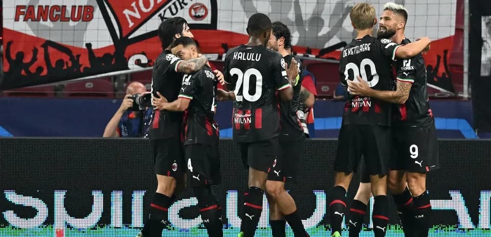 AC Milan players celebrating a goal AC Milan players celebrating a goal