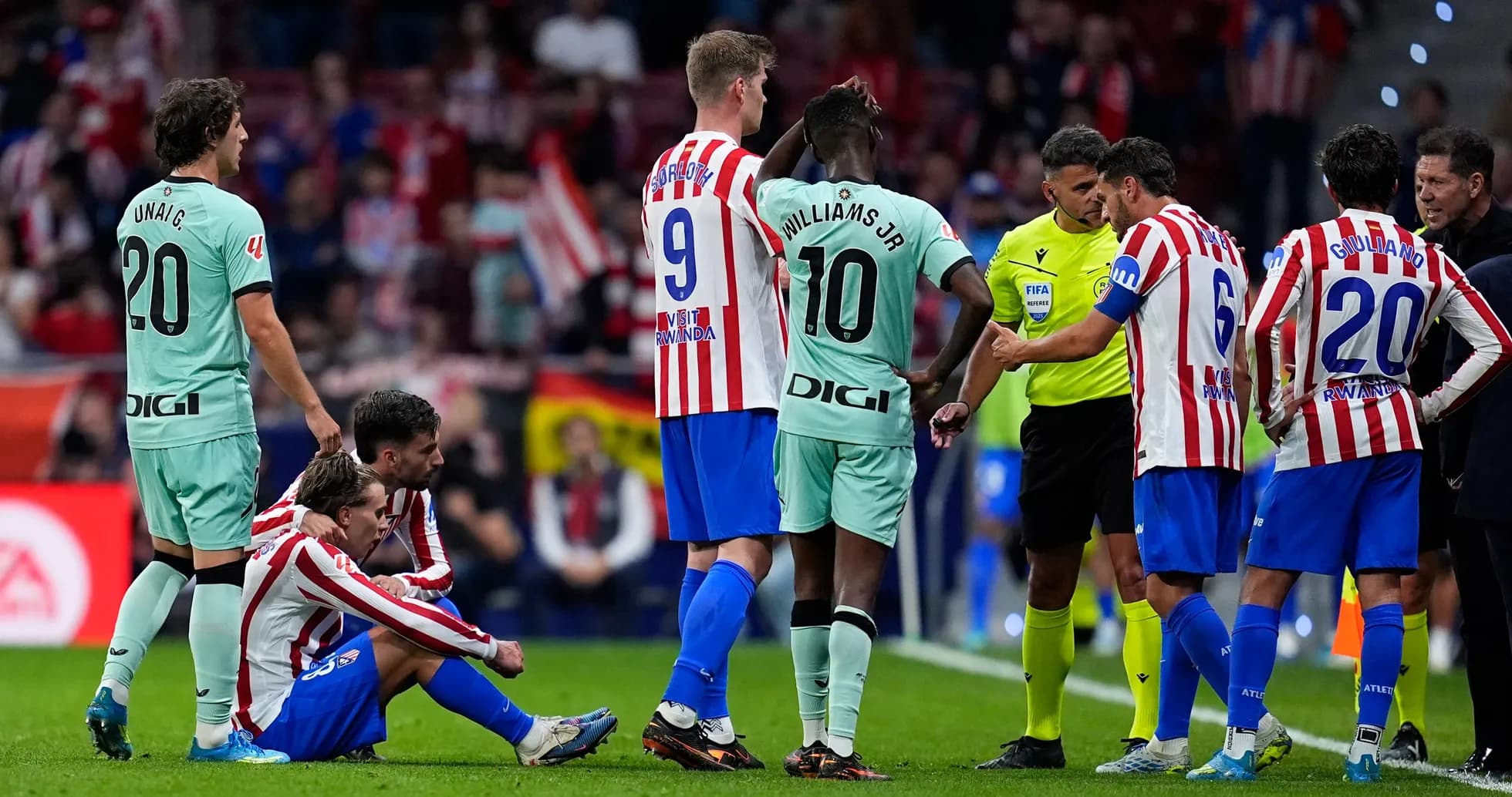 Players discussing with referee during La Liga match Players discussing with referee during La Liga match