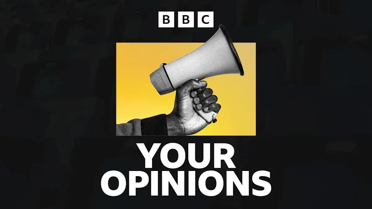 Hand holding megaphone against yellow background Hand holding megaphone against yellow background