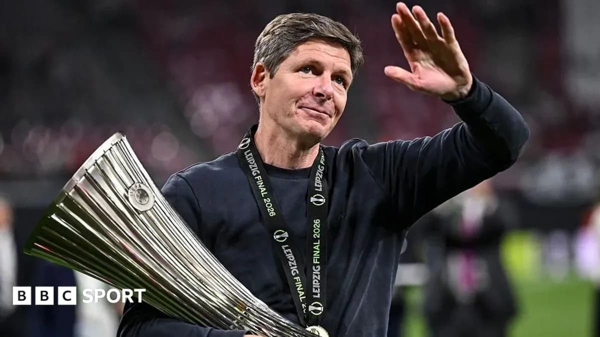 Coach celebrating with trophy at Leipzig Final 2026 Coach celebrating with trophy at Leipzig Final 2026