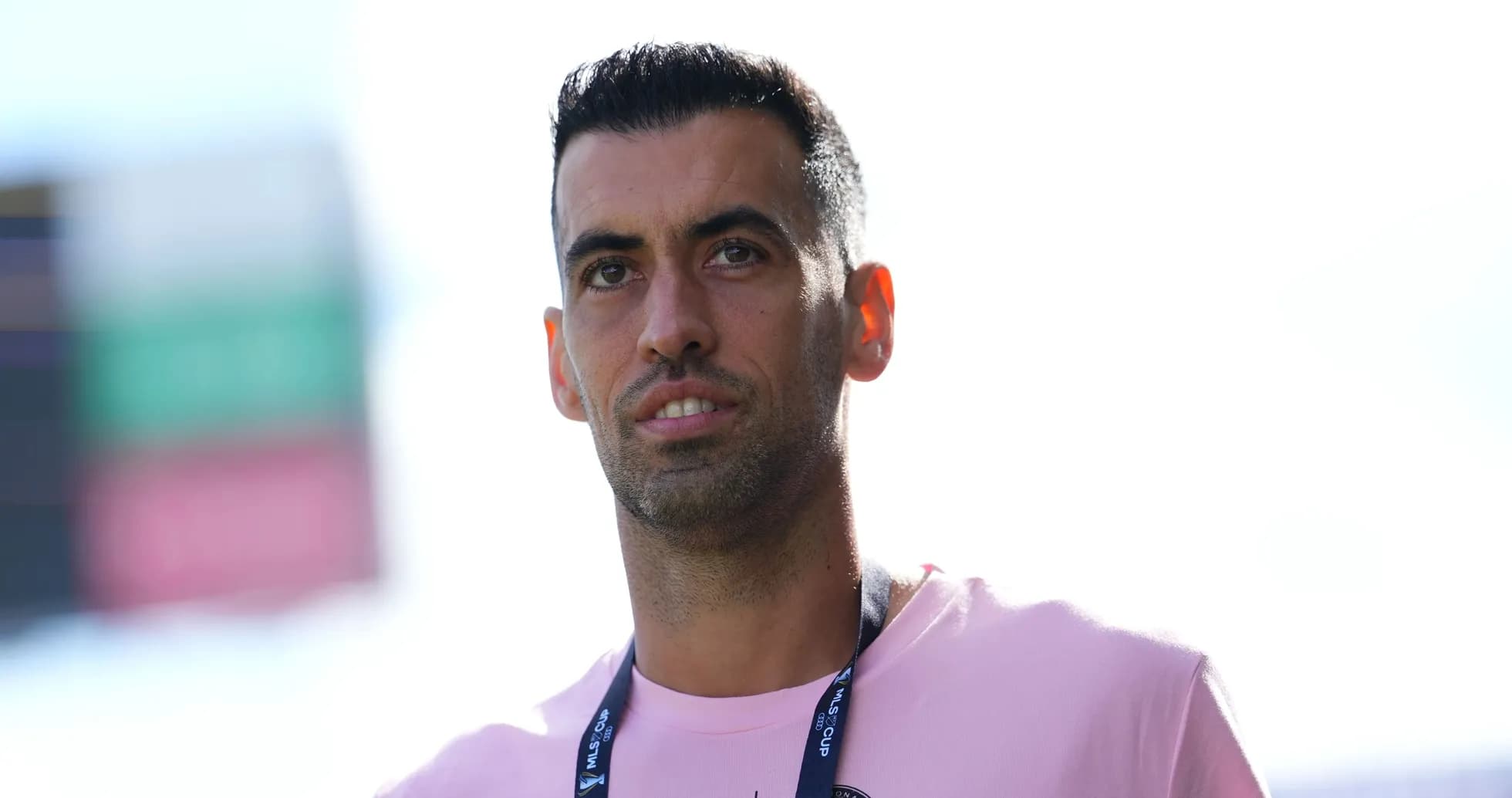 Player in pink shirt standing on the field Player in pink shirt standing on the field