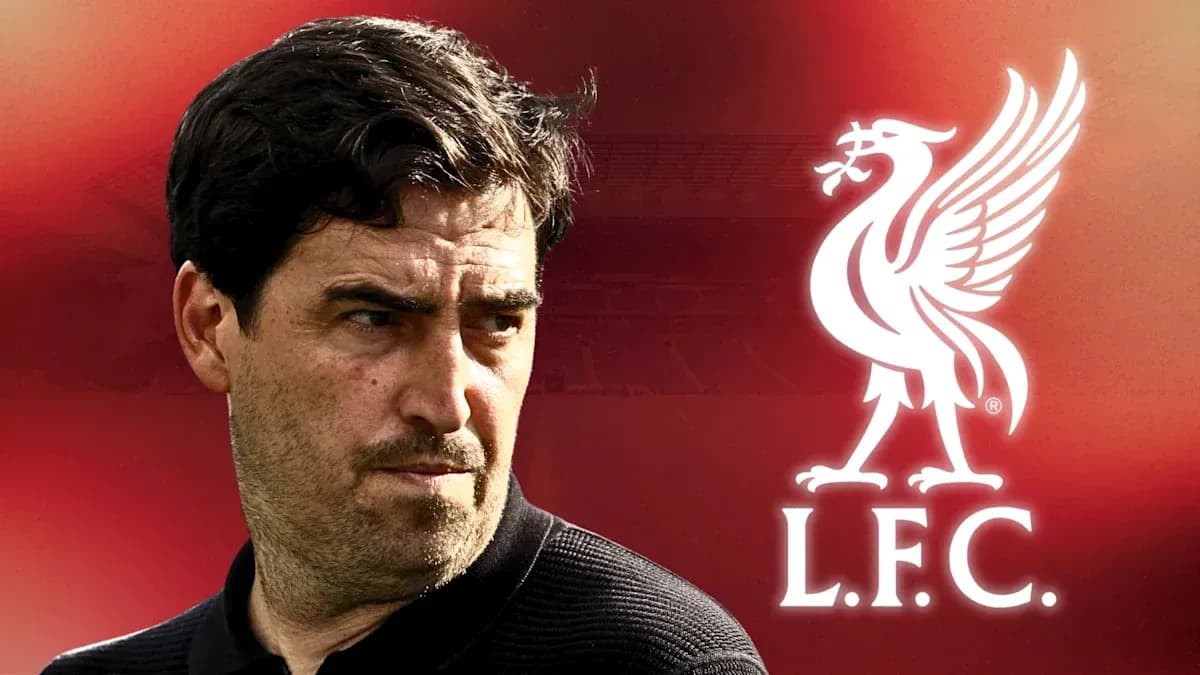 Man looking serious with Liverpool logo in background Man looking serious with Liverpool logo in background