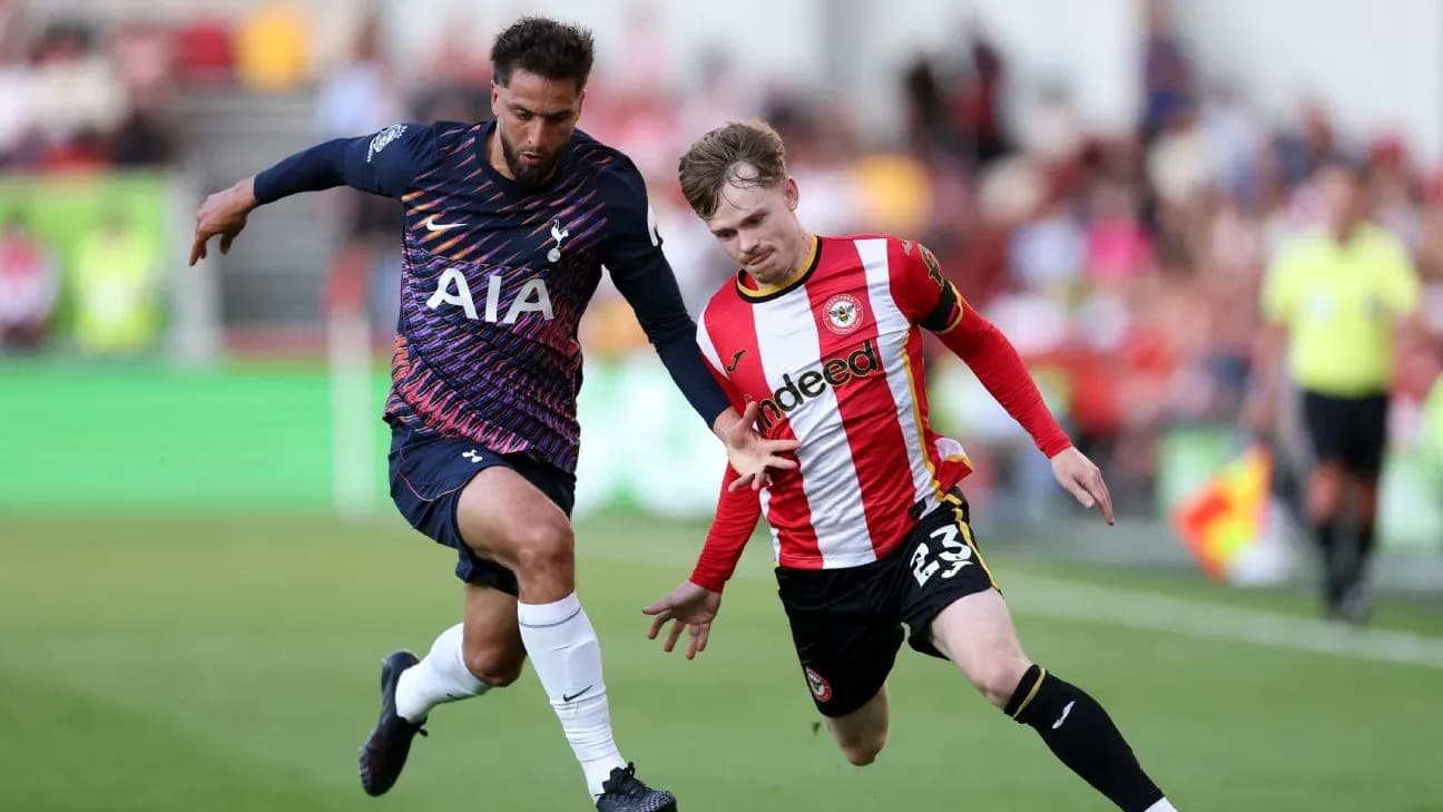 Brentford and Tottenham players contesting the ball Brentford and Tottenham players contesting the ball